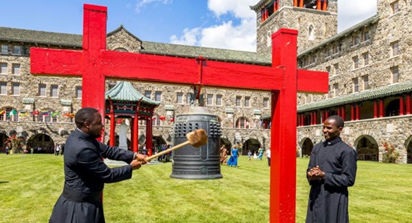 Newly ordained priests and seminarians ringing the Mission Bell on the Maryknoll campus.